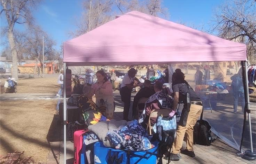 Volunteer providing haircut services